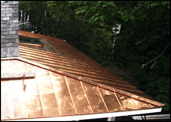 Copper & metal roofing, copper gutters & downspouts, custom copper, aluminum, steel chimney caps, copper & metal ice & snow shields, roof snow removal, historical copper roofing repair & restoration Worcester MA, Boston MA, NH, VT, RI, CT